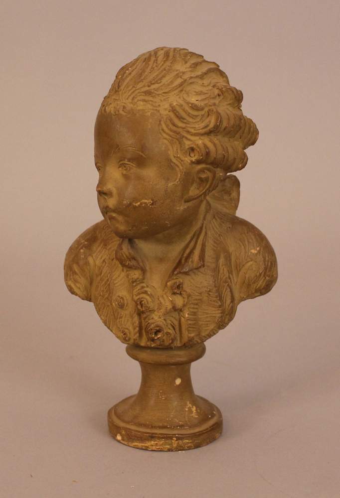 French terracotta bust of a young boy, on integrated round terracotta base and sculpted, with - Image 2 of 3