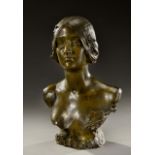 MAURICE BOUVAL (1863-1916) Sculpture en bronze à patine brune fi gurant une jeune femme en buste