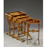 EMILE GALLE (1864-1904) Très rare suite de quatre tables gigognes en noyer présentant des plateaux