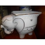 A Ceramic Elephant Plinth, Wash Jug & Boat-Shaped Vase.