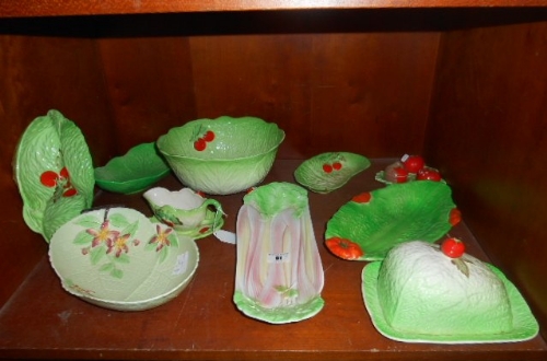 A Shelf of Naturalistic Serving Dishes including rhubarb dish, cruet set, etc.