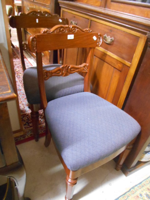 A Pair of Mahogany Bar-Back Dining Chairs in the Regency Taste with upholstered seats and standing