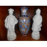 A Highly Decorated Vase & a Pair of Bisque Continental Figures.