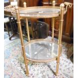 A French Two-Tier Brass & Mirrored Serving Cart with shaped handles.