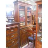 A 19th Century Walnut Library Bookcase, the upper section fitted four shelves enclosed by a pair