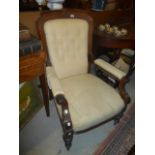 A Late Victorian Mahogany Framed Upholstered Armchair, with button-back upholstery.