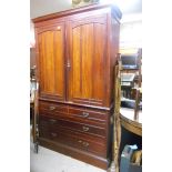 A Late Victorian Mahogany Linen Press, the top with two cupboard doors, this above two short and two