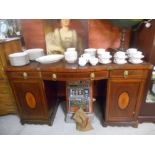 An Early 19th Century Mahogany and Marquetry Inlaid Twin Pedestal Sideboard with three top drawers