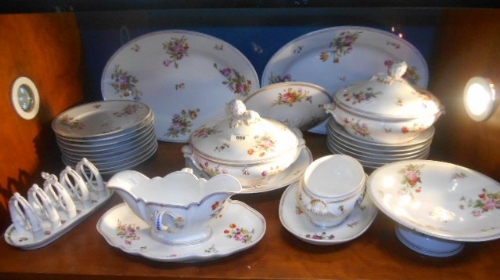 A Collection of Edwardian Floral Tablewares including tureens, large oval serving plates etc.,