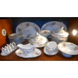 A Collection of Edwardian Floral Tablewares including tureens, large oval serving plates etc.,