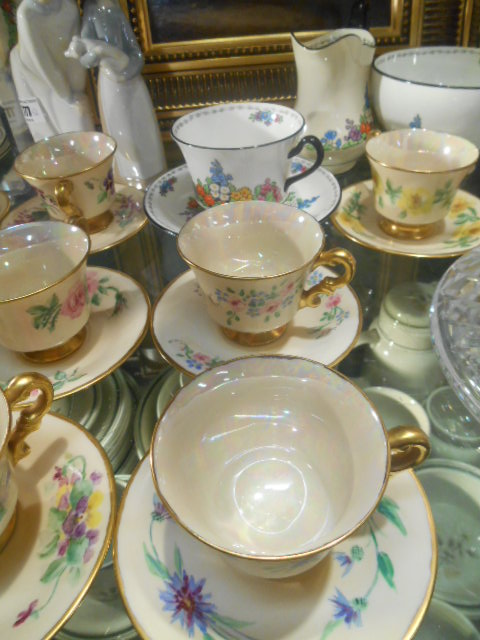 A Set of 12 Demi-Tasse Cups & Saucers, each individually decorated with flowers and with lustrous - Image 2 of 2