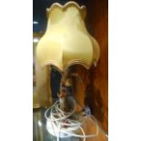 A Goebel Figural Table Lamp with shade.