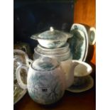 A Quantity of Green & White Ironstone Tea & Dinner Wares decorated with windmills.