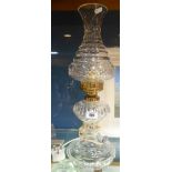 A Tall Waterford Crystal Table Lamp, in the style of an oil lamp with reservoir and shade.