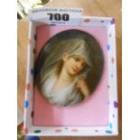 A Continental Porcelain Oval Plaque, Painted with Portrait of a Girl in a Lace Veil.