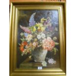 An Oil on Panel, Still Life of Flowers in a Vase, in gilt frame.