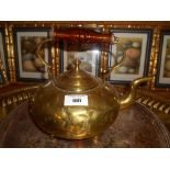 An Old Brass Toddy Kettle with Amber Handle.