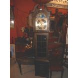 A Mahogany Finish Longcase Clock, with brass and silvered dial, moon phase, glazed door, on