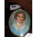 A Miniature Watercolour Portrait of a Lady, in gold coloured frame.