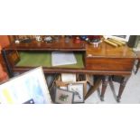 A 19th Century Mahogany Square Piano Case, Converted to a Desk, standing on fluted legs & castors,