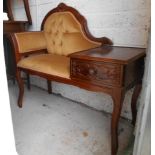 A Hallway Telephone Table/Seat with deep buttoned gold velour upholstery.