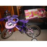 A Boxed Girls Bike, Another Bratz Bike, Skates & Helmets.