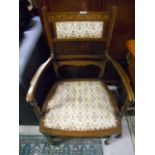 An Edwardian Mahogany and Inlaid Occasional Elbow Chair.