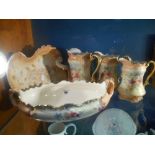 A Quantity of Blush Ivory Ceramics including a set of three graduated jugs.