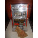 An Arcadian Gold Star Vintage Slot Machine.