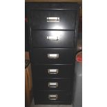 A Six-Drawer Narrow Filing Cabinet.