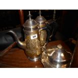 A Pair of Heavy Silver-Plate Coffee Pots and a Three-Part Muffin Dish.