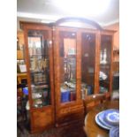 A 20th Century Continental Style Glazed Display Cabinet with gilt column tops.