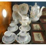 A Part Aynsley Coffee Service in the Wild Tudor Pattern, with five coffee cans, six saucers, six