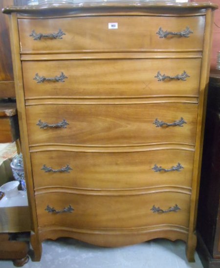 A 20th Century American Serpentine Front Chest of Five Long Drawers.