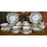 An Attractive Noritake tea Service for Eight, with relief gilt decoration on a white and green