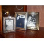 Three Silver Picture Frames.
