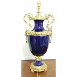 A COBALT BLUE AND ORMOLU MOUNTED TABLE LAMP, NOW ELECTRIFIED. HEIGHT 14ins APPROXIMATELY.