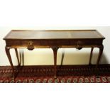 A FINE WALNUT VENEER SIDE OR SERVING TABLE ON CABRIOLE LEG WITH LIFT TOP, FRIEZE DRAWERS, SHELL