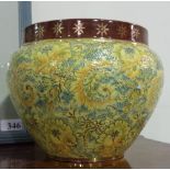 AN EDWARDIAN DOULTON JARDINIERE IN GILT AND YELLOW. HEIGHT 8ins. WIDTH 9ins.