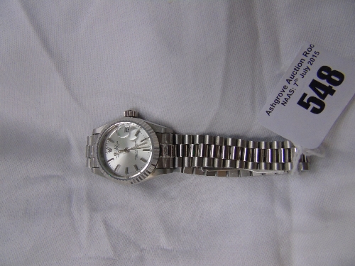 A Ladies Replica Rolex Automatic Movement Watch.