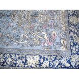 A Modern Pale Blue Ground 'Tree of Paradise' Rug, 52" x 72 approx.