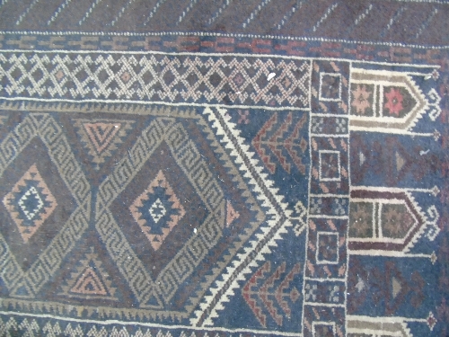 A Baluchi Tribal Rug.