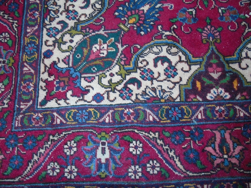 A Red Ground Persian Bakhtiar Rug.