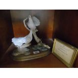 A Country Artists Figural Group of Doves on a Wooden Base, complete with framed certificate,