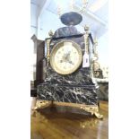 An Edwardian Gilt Metal and Marble Mantel Clock.