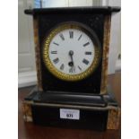 A 19th Century Black Slate and Rouge Marble Mantle Clock, with enamel white dial, circa 1860.