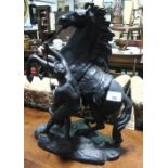 A Pair of Late 19th/Early 20th Century Black Painted Spelter Marley Horses