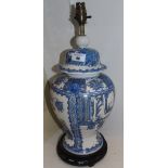 An Oriental Table Lamp Standing on a Turned and Pierced Base.