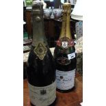 Two large Bottles of Champagne, 150cl, one Laurent Perrier and the other Pol Roger & Co.