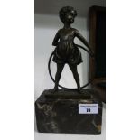 A Bronze Figure of a Young Girl & Hoop, on a variegated marble base.